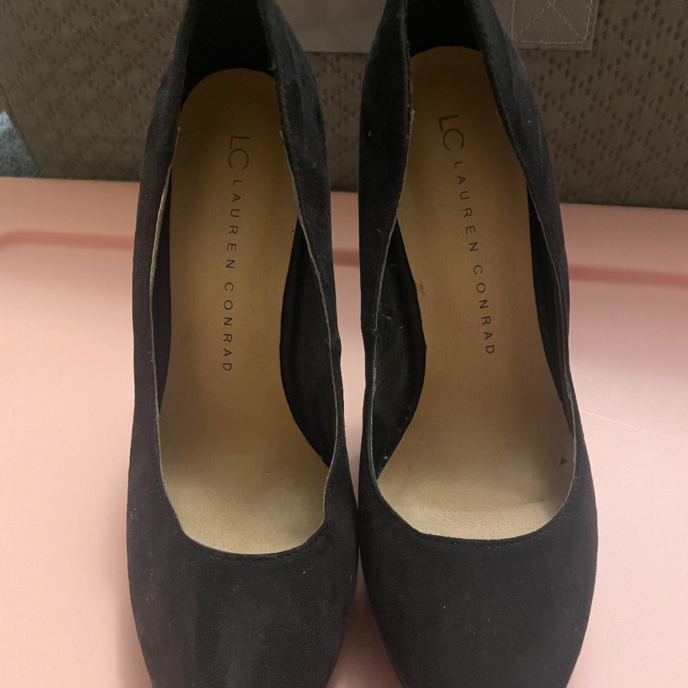 Black suede pumps